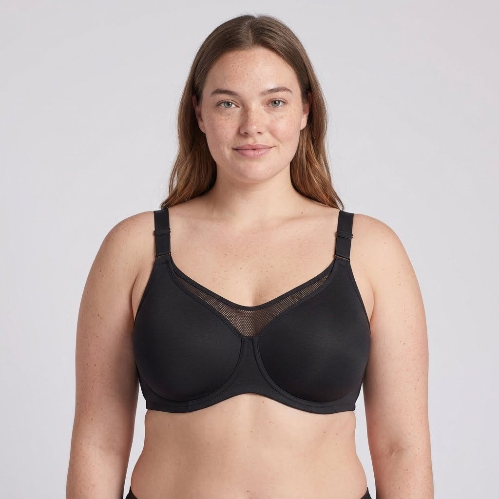 Lovelle Grace in black from the front with four marked details: mesh panel, straps, cup and underwire